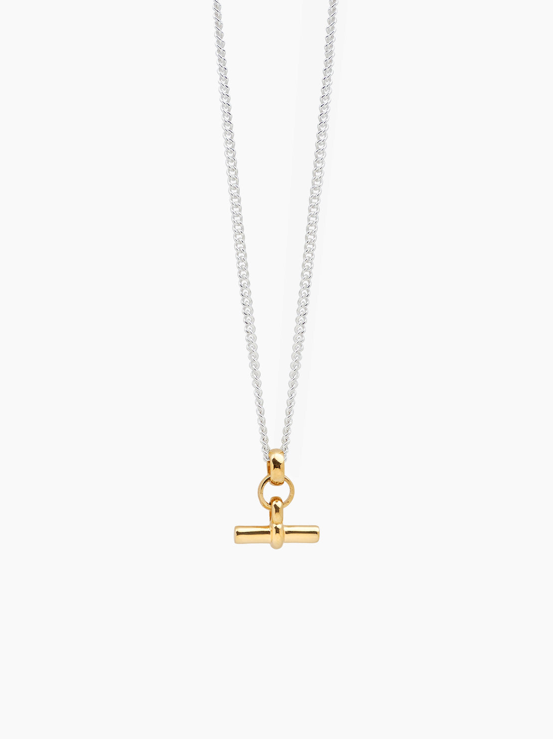Mini gold T-bar pendant on fine silver curb chain necklace