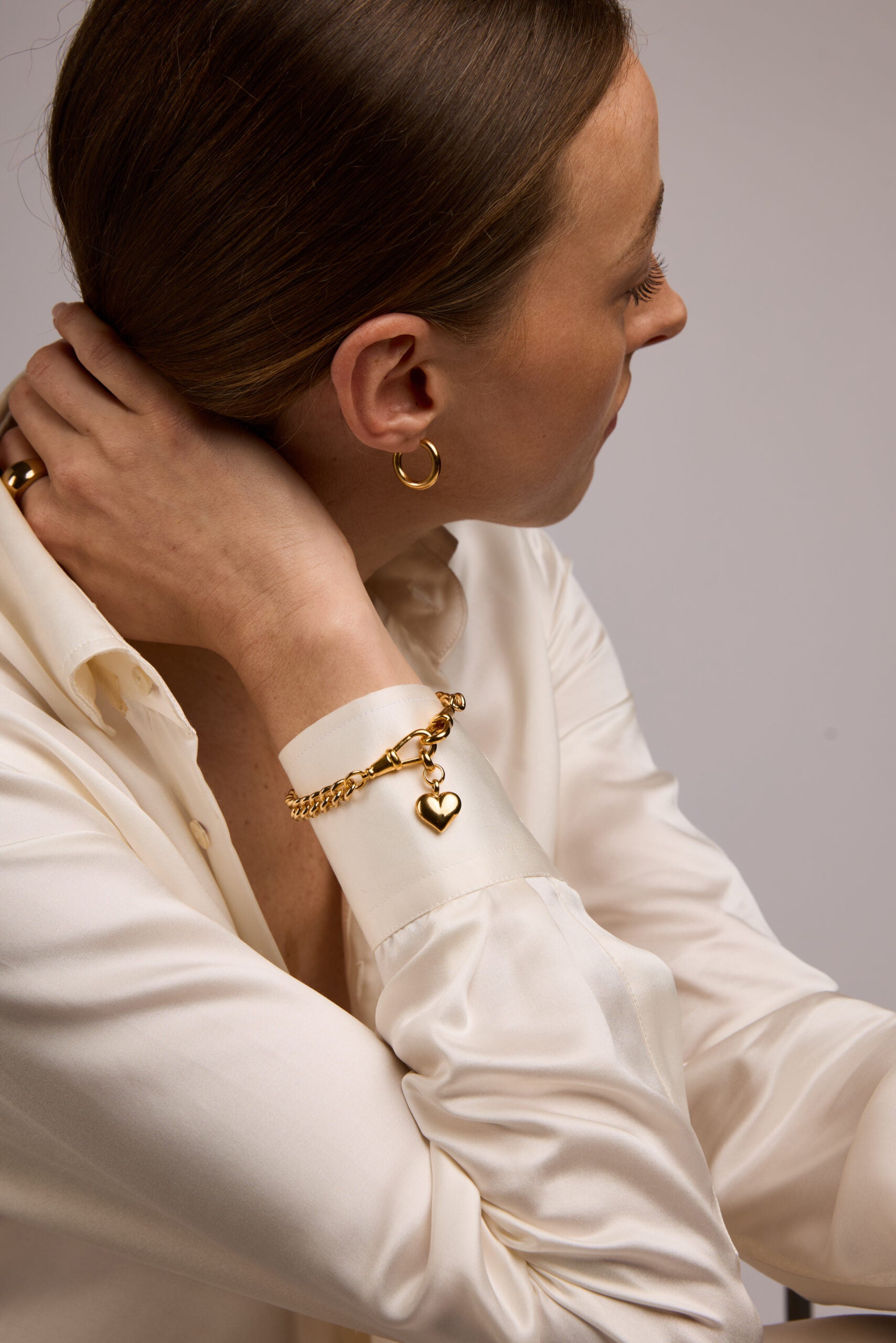 Small Gold Heart on Medium Curb Clipt Bracelet