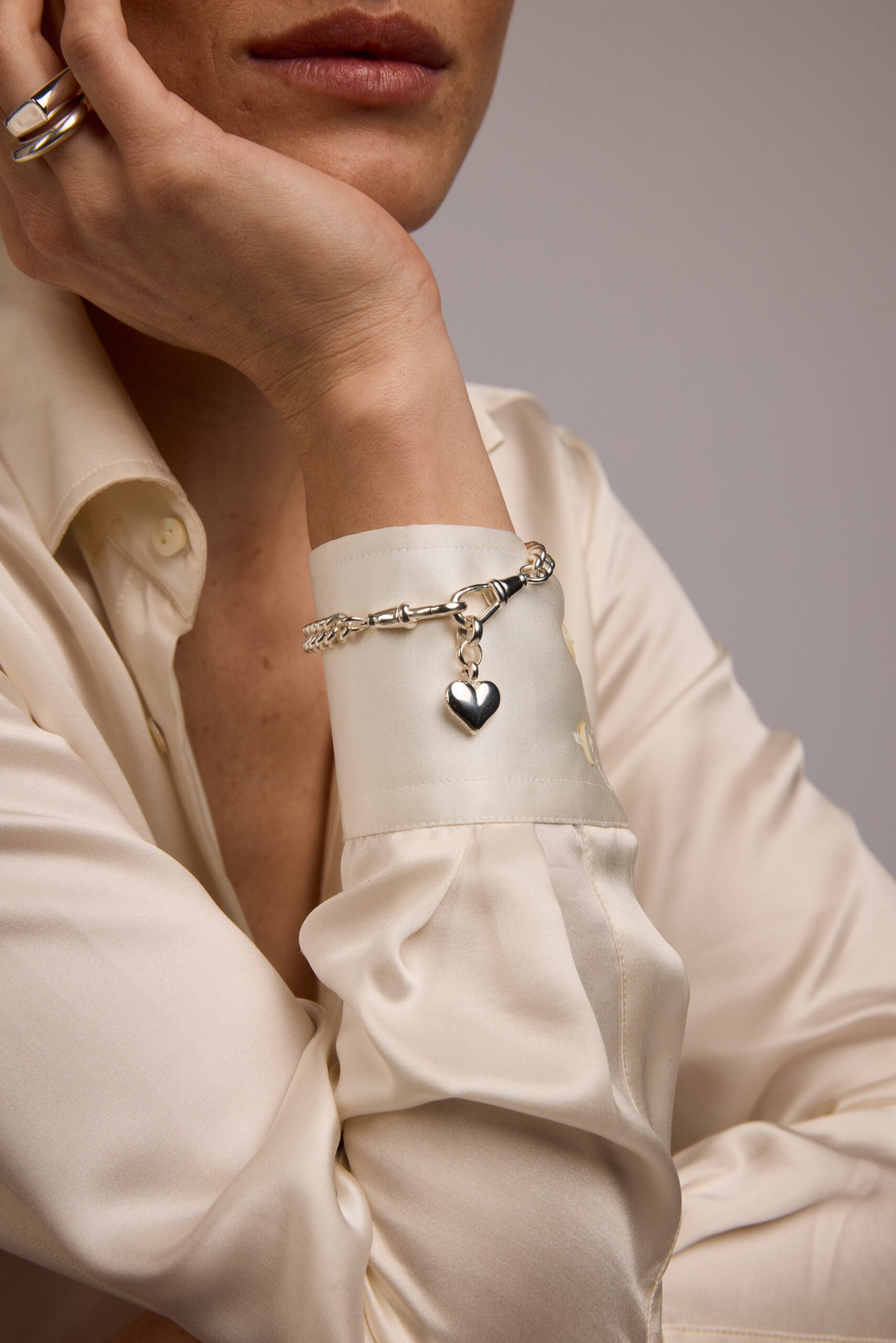 Small Silver Heart on Medium Curb Clipt Bracelet