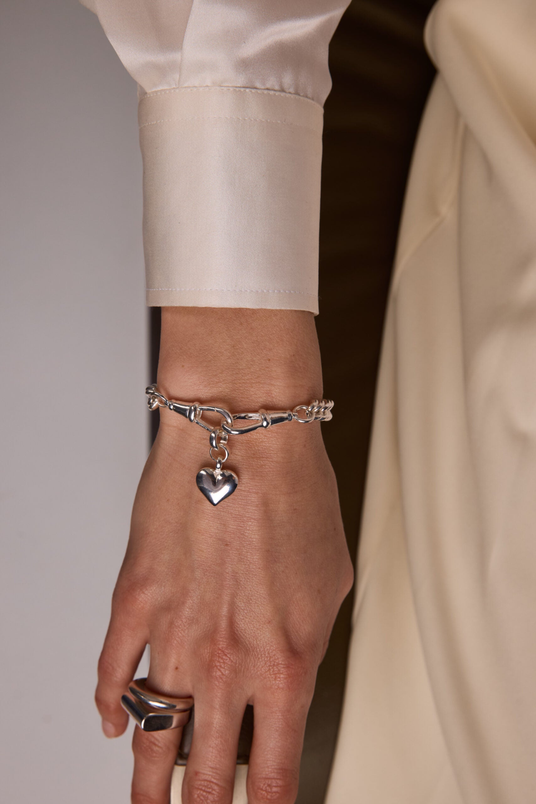 Small Silver Heart on Medium Curb Clipt Bracelet