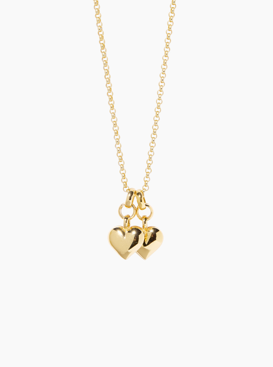 Gold necklace with heart pendants on a white background