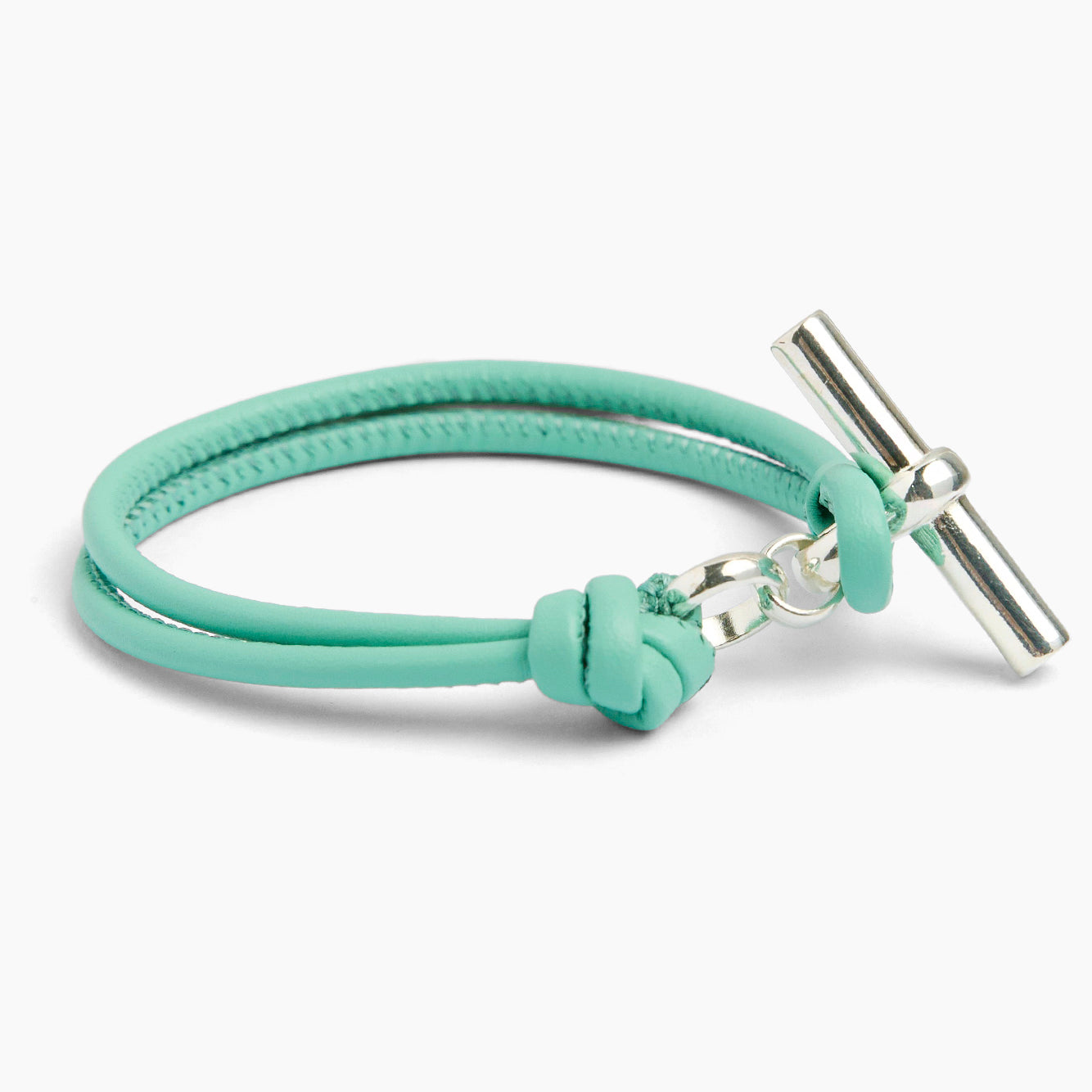 Light teal leather bracelet with silver T-bar charm and knot clasp