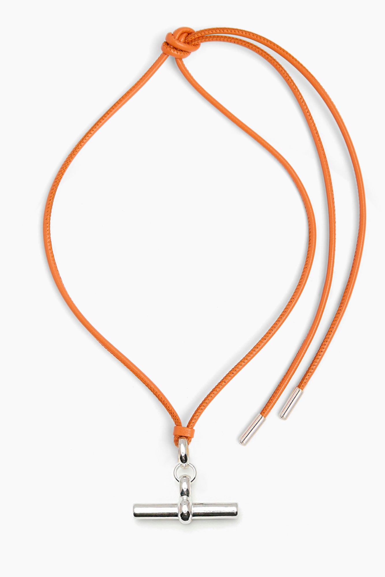 Orange leather cord necklace with medium silver T-bar pendant and two cord ends.
