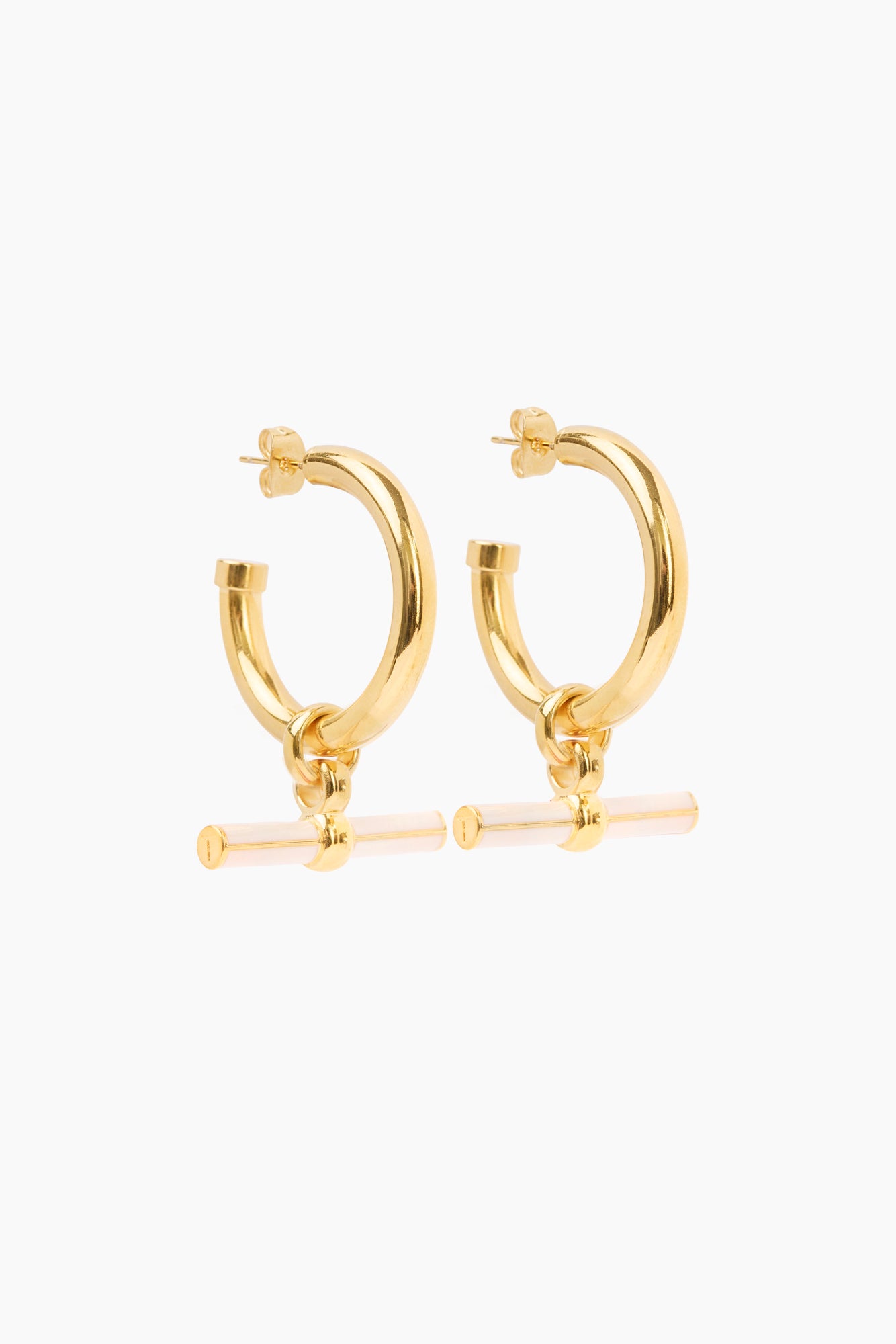 Gold-tone hoop earrings with cream enamel T-bar dangles and small bow charm