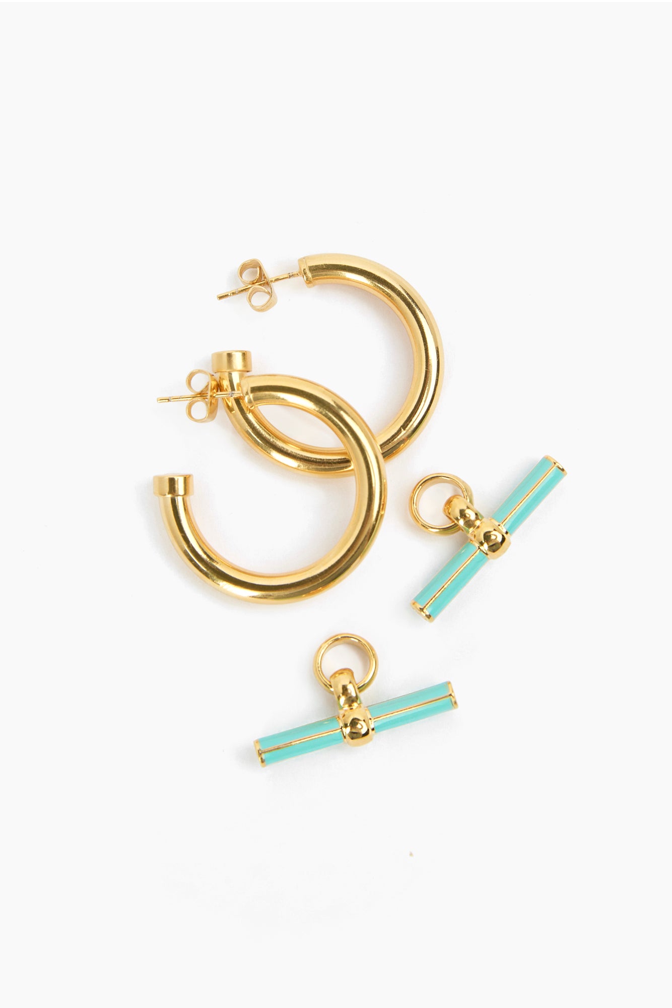 Pair of gold earrings with mint enamel bar charms and hinged hoops