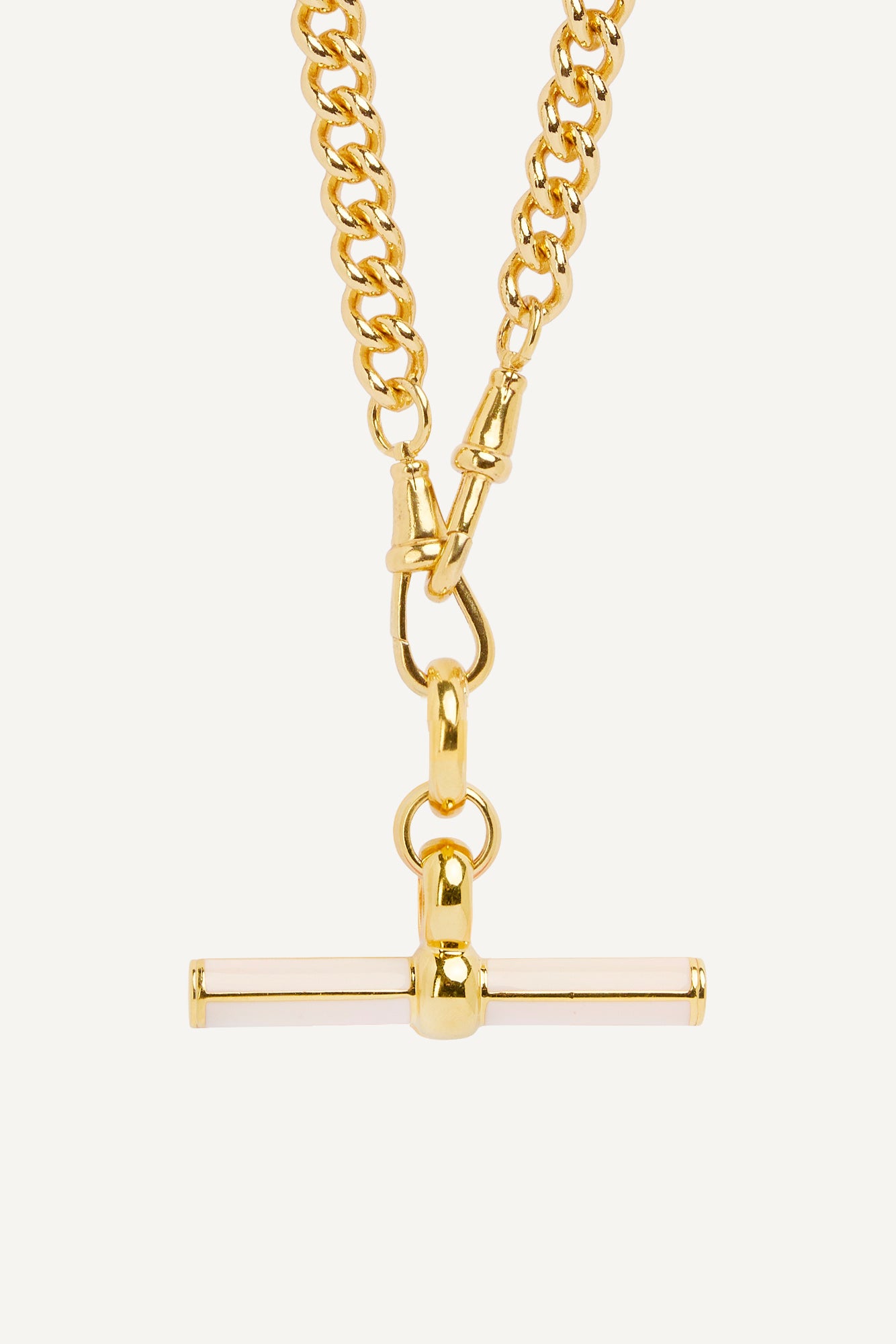 Gold curb chain necklace with T-bar enamel pendant detail