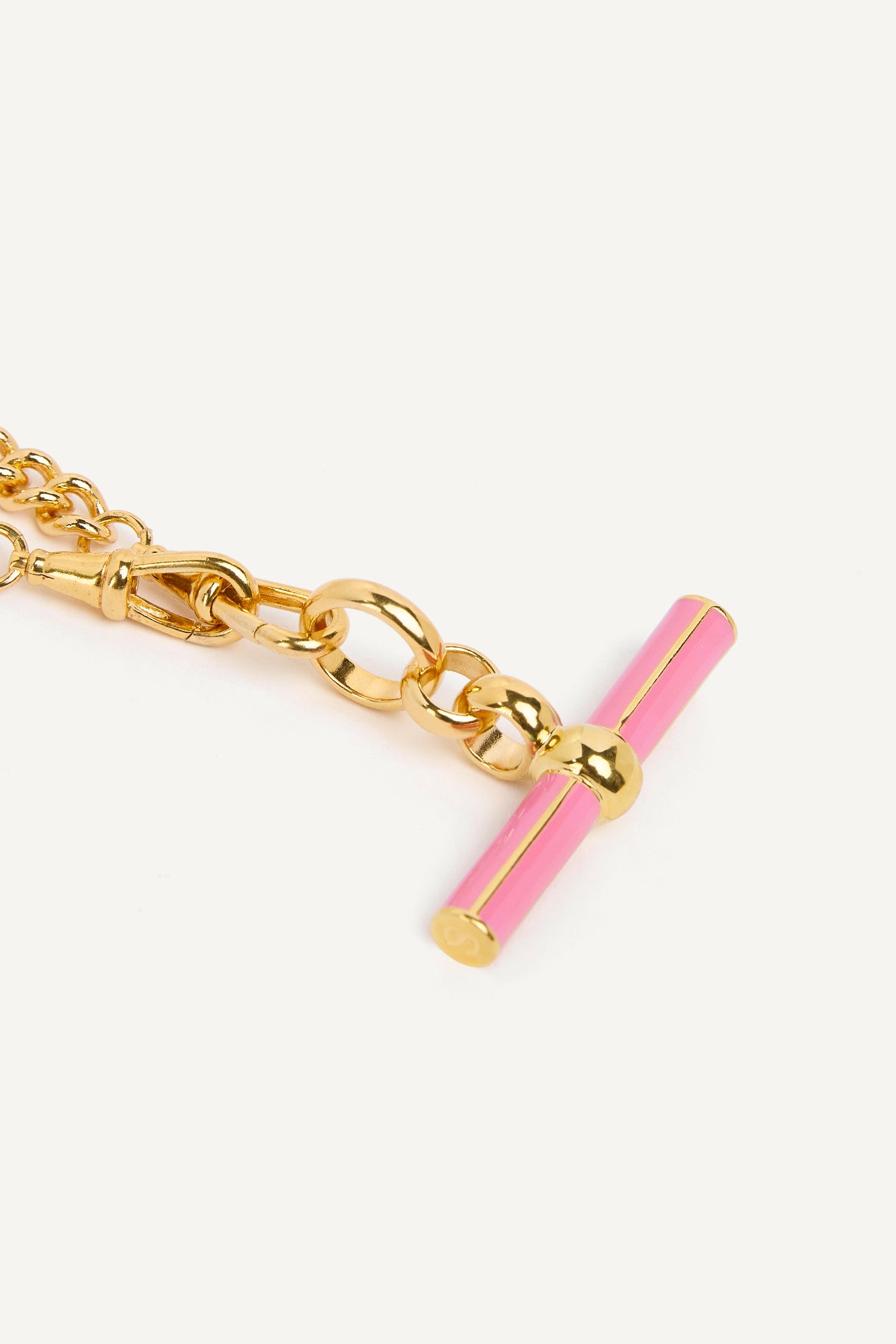 Gold curb chain with pink enamel bar T-bar pendant and clasp loop