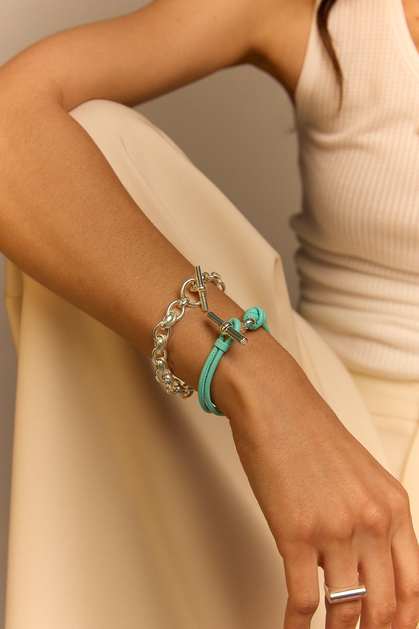 Light teal leather bracelet with silver chain and silver T-bar accent
