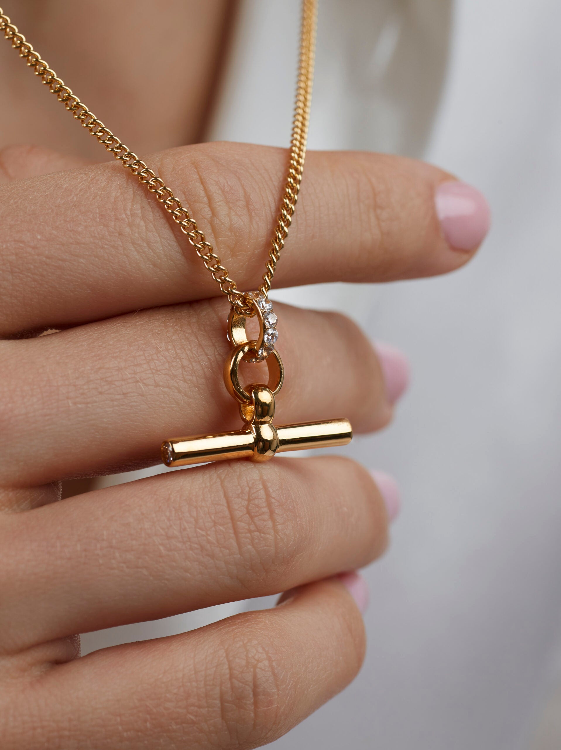 Small Jewelled Gold T-Bar On Fine Curb Chain