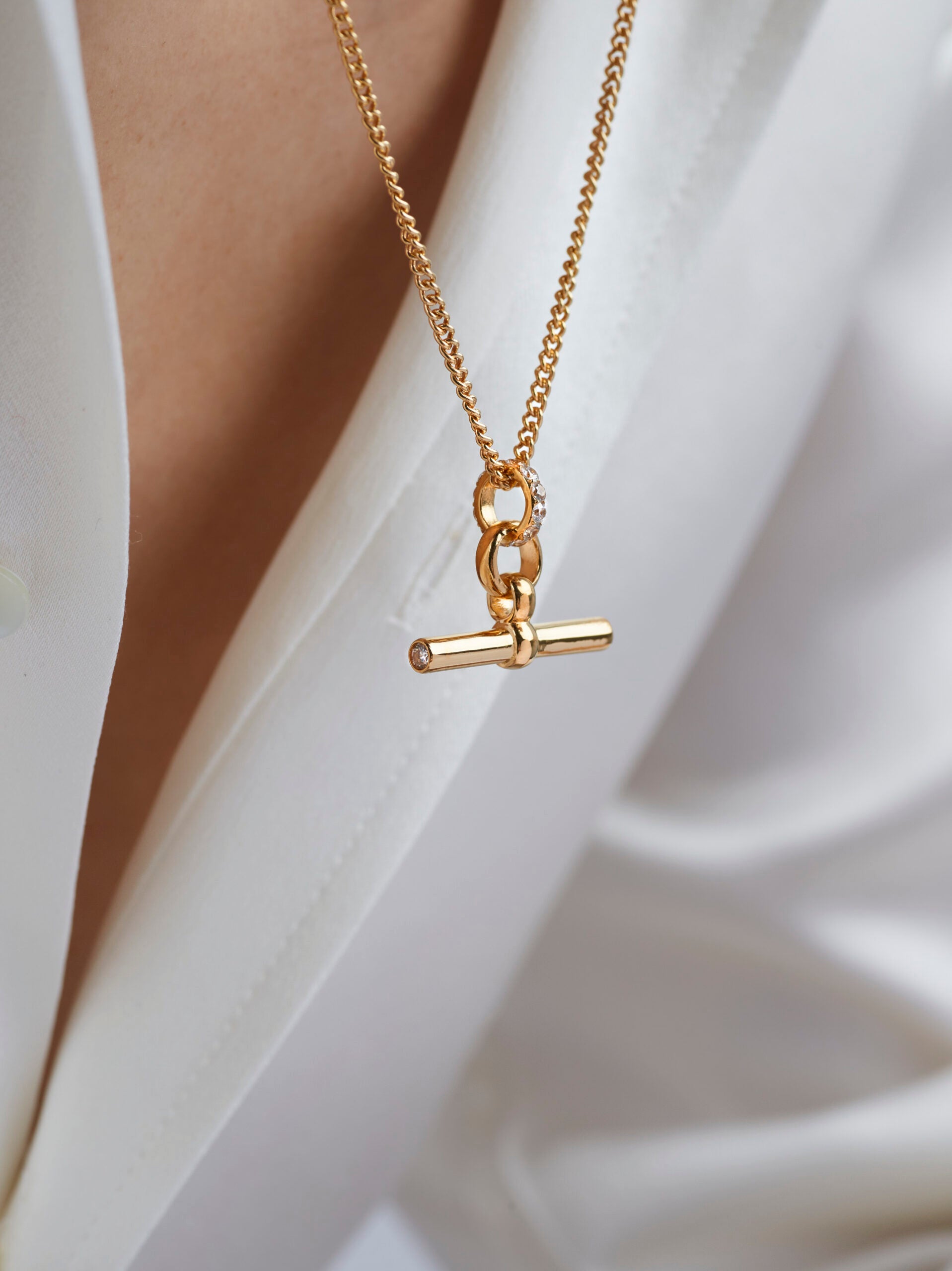 Small Jewelled Gold T-Bar On Fine Curb Chain