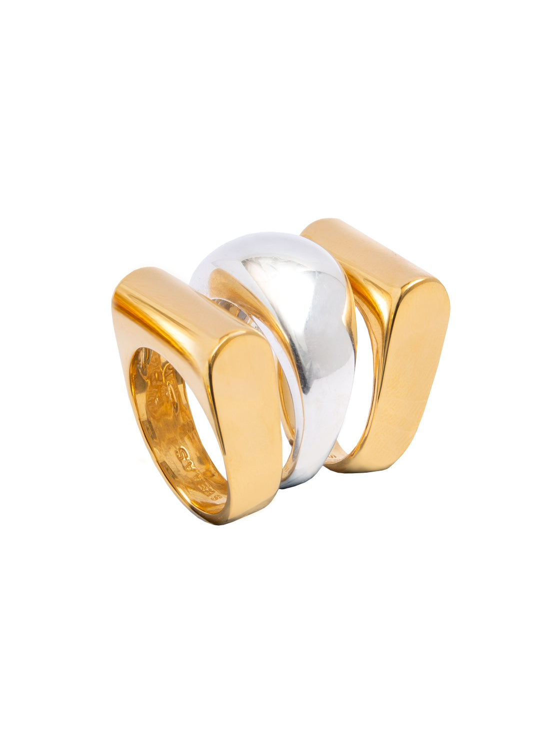 Triple ring set with gold outer bands and silver center band, angled view