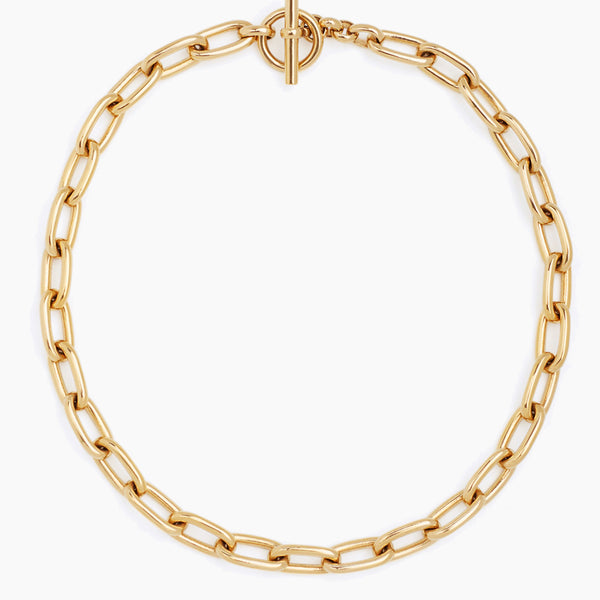 Gold oval link chain necklace with circular clasp centerpiece